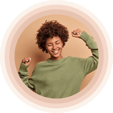 a black woman dancing with three circles around her