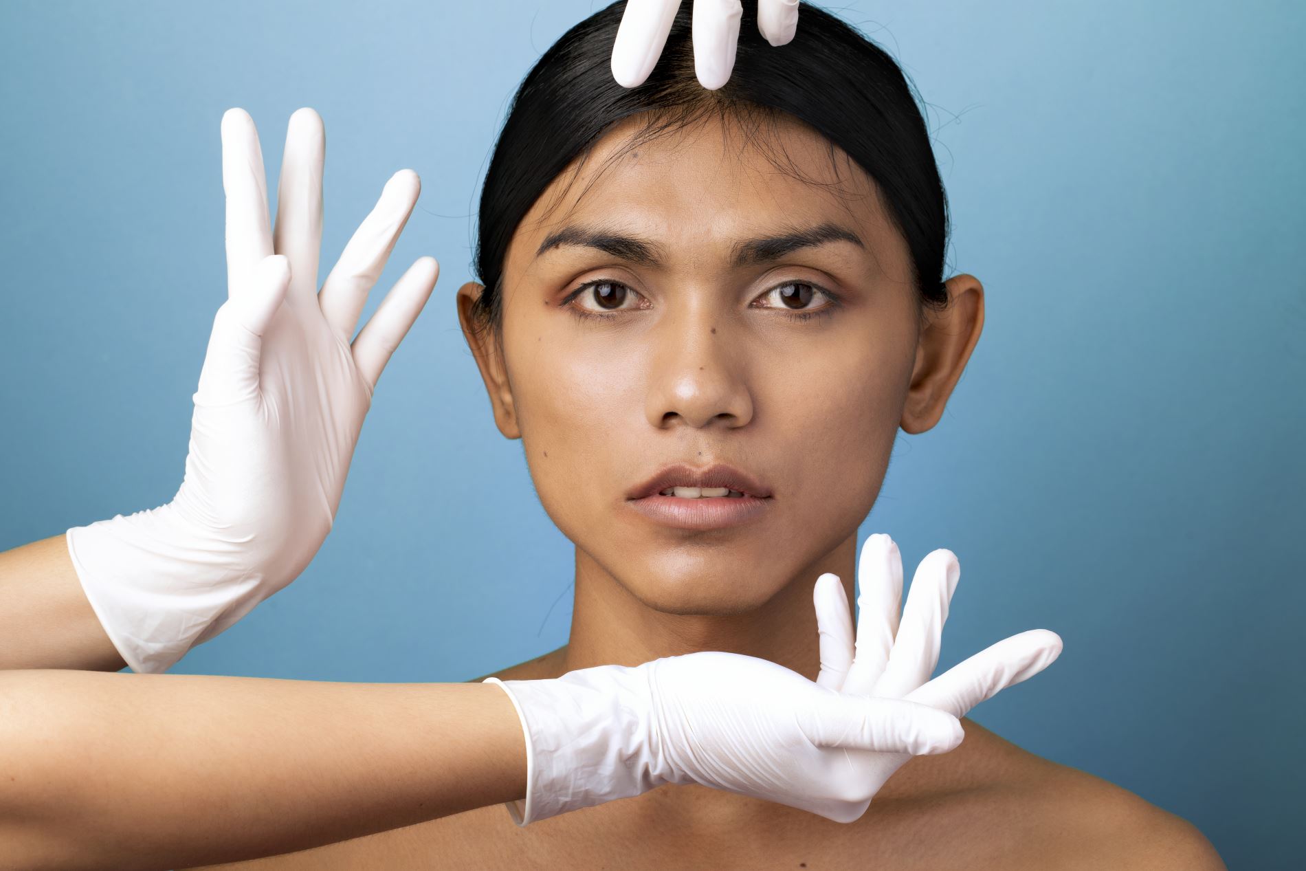 A woman at Limelight Medical Spa in Cincinnati is having her head examined by a doctor.