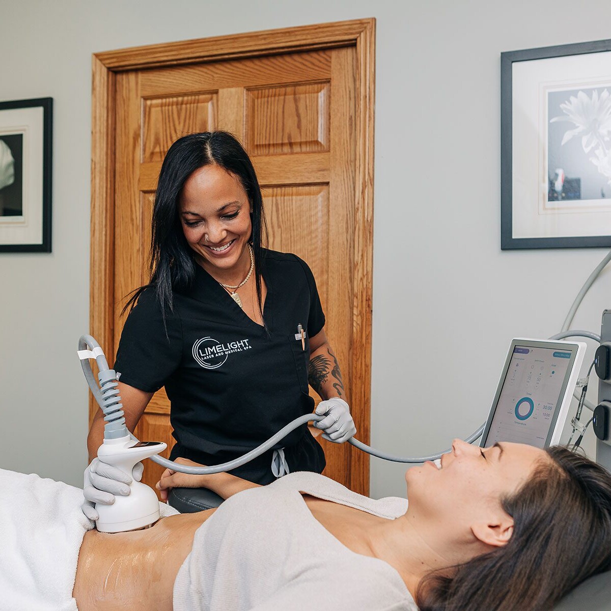 A woman is receiving a treatment in a Cincinnati medical office.