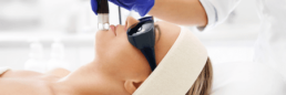 A woman is visiting a Laser Center in Cincinnati for a laser treatment on her face.