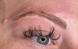 A close up of a woman's eye with long lashes at a Health Spa in Cincinnati.