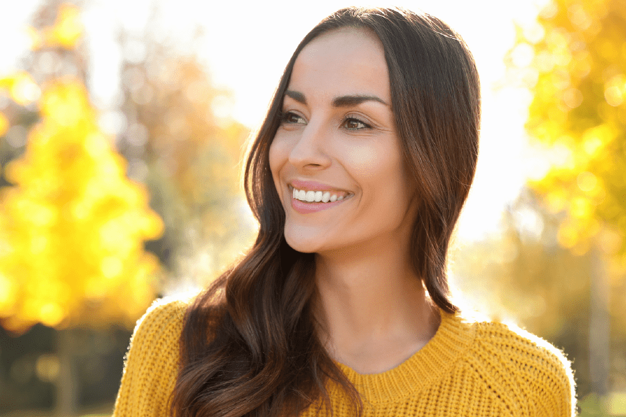 model smiling showing beautiful medical spa results